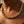 Load image into Gallery viewer, Gold chain necklace with intricate interwoven links, elegantly worn