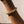 Load image into Gallery viewer, Gold chain bracelet with intricate interwoven links, elegantly displayed on a wrist 
