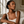 Load image into Gallery viewer, Model wearing Umutoni Asani gold earrings as part of a luxury jewellery look.
