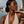 Load image into Gallery viewer, Model wearing Umutoni Nalla stud gold earrings, handmade in Kenya.
