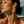Load image into Gallery viewer, Model wearing Umutoni Terema gold earrings, handmade in Kenya.
